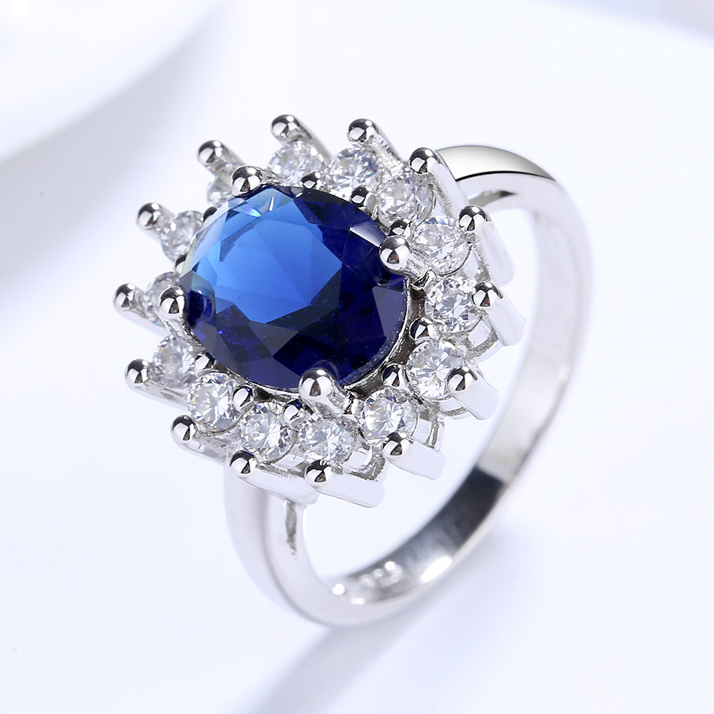 Sterling Silver Halo Blue Sapphire Cocktail Ring in White Gold