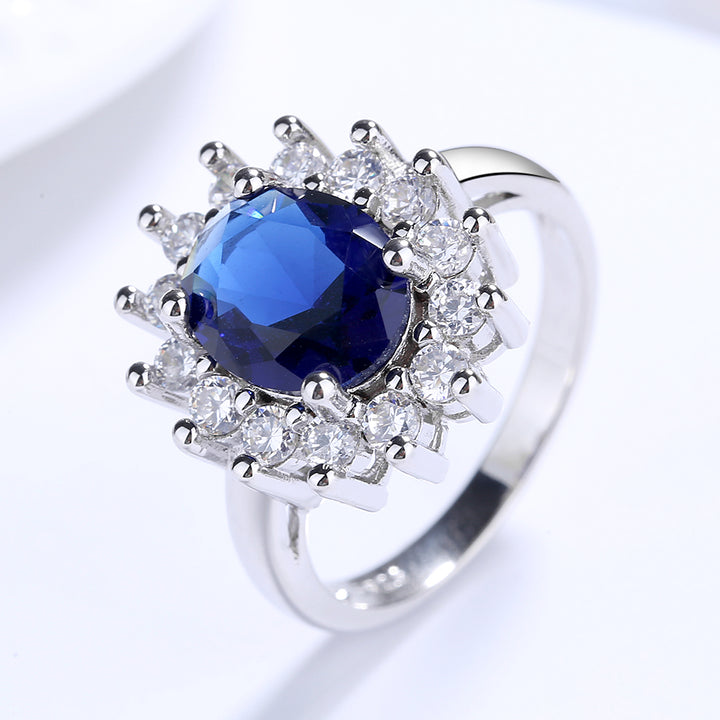 Sterling Silver Halo Blue Sapphire Cocktail Ring in White Gold