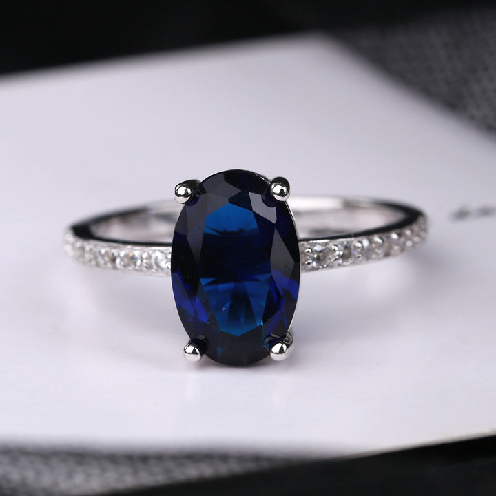 Amy and Annette Sapphire and Sterling Silver Oval Solitaire Ring