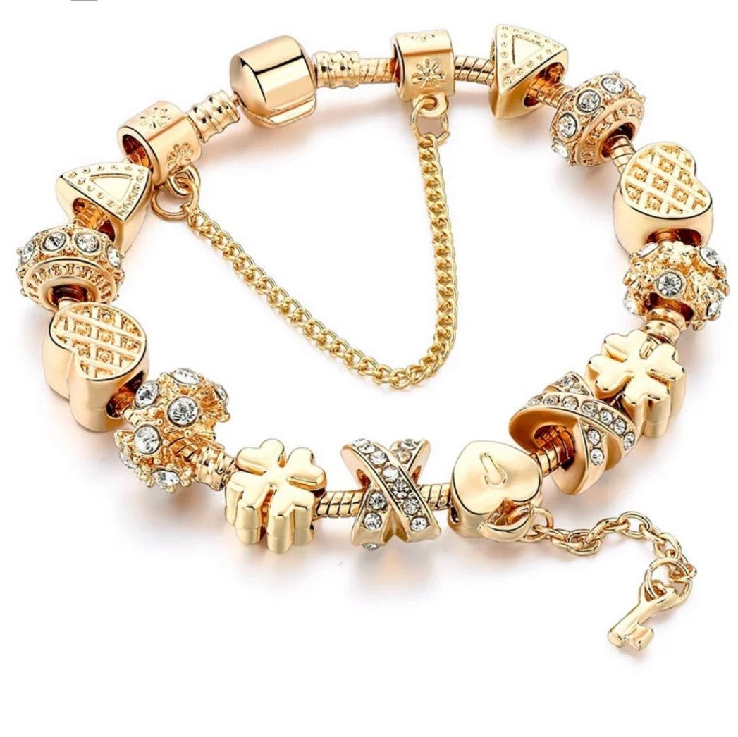 14K Gold Charm Bracelet with crystals from Swarovski