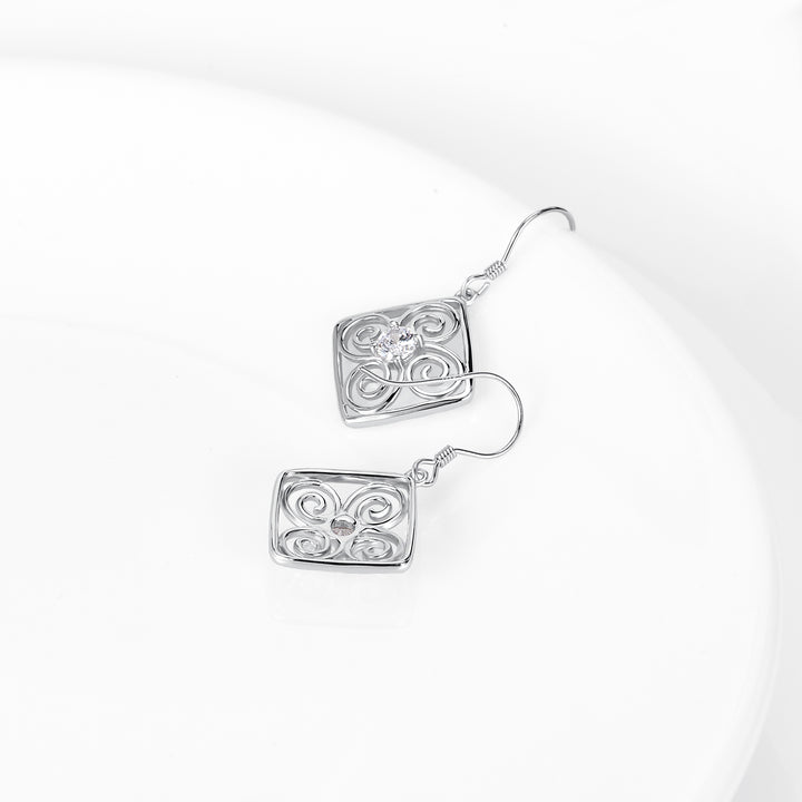Sterling Silver and White Topaz Drop Swirl Earrings